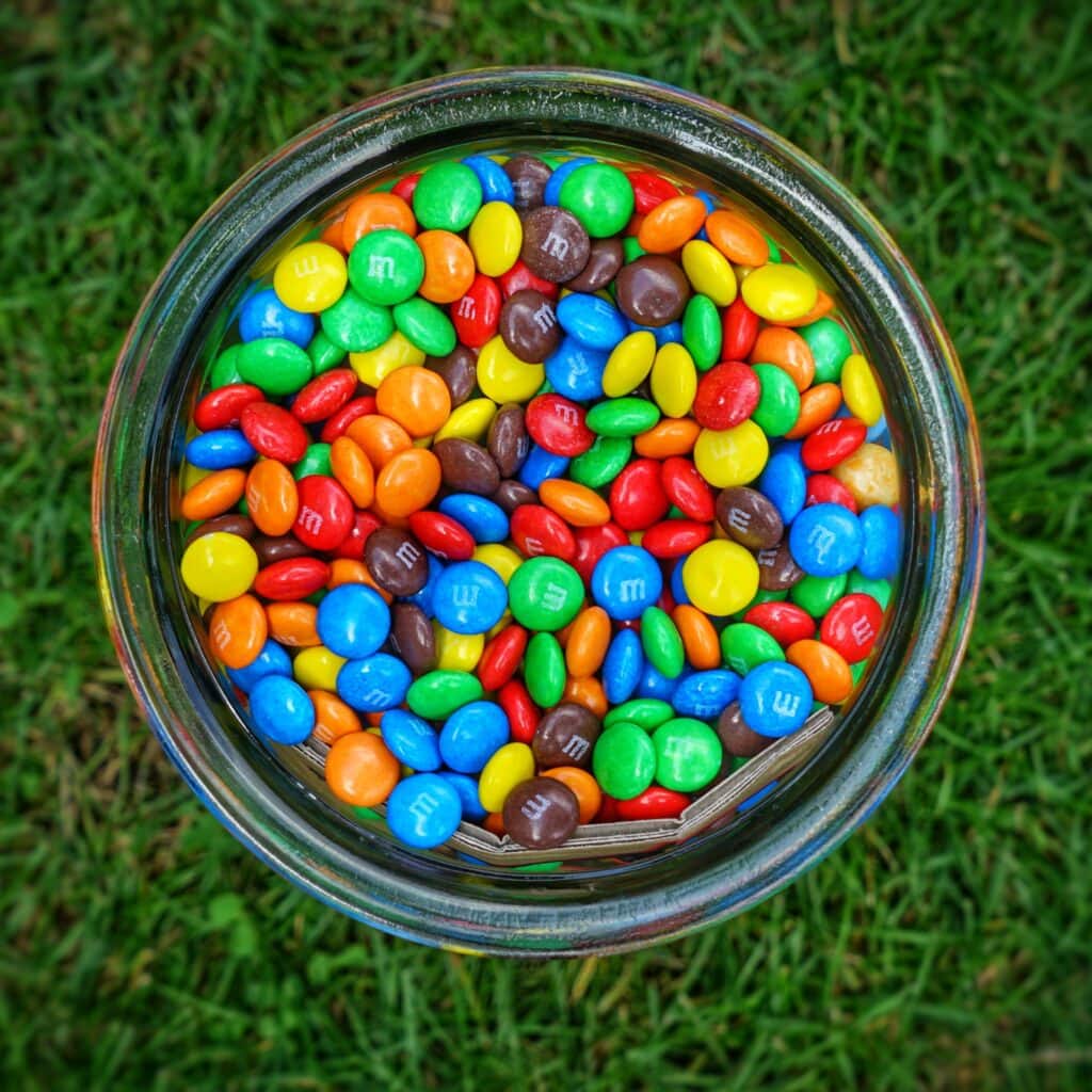 M & M candy in glass jar